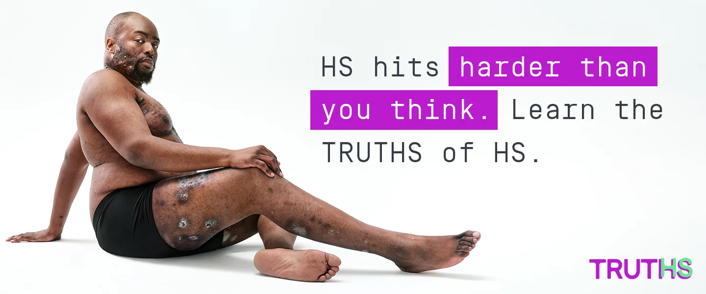 To the right of the image, a Black man poses with his face towards the camera and his body away while sitting down. The back of his thighs are exposed, showing scars from his hidradenitis suppurativa (HS) flares. To his right reads a headline "HS hits harder than you think. Learn the TRUTHS of HS." Below the headline is a tag with the patients name which reads "Parish, real HS patient."  Next to his foot is the TRUTHS logo with the HS in TRUTHS highlighted in teal. 